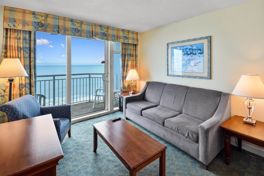 Discover coastal living at its finest in this beautiful - photo 2
