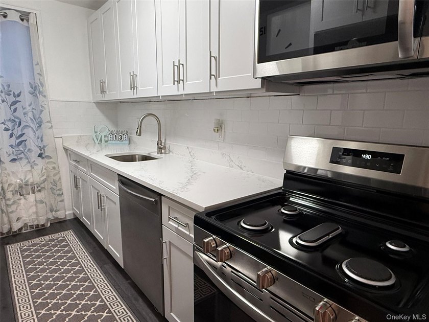 Move-right into this bright and updated top-floor 1-bedroom, 1 - photo 7