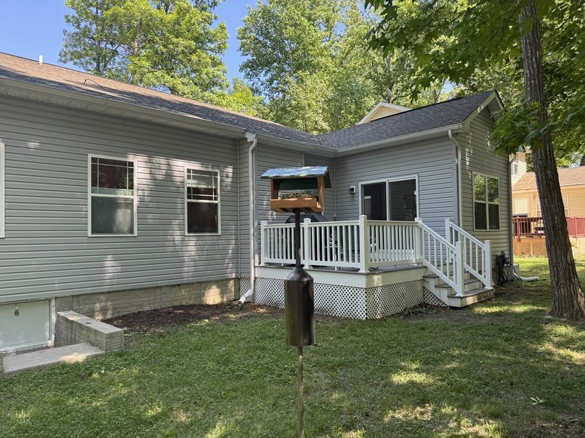 This beautiful home with a .37-acre wooded lot is located on a - photo 33