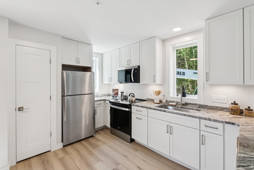 NEW PRICE FOR NEW CONSTRUCTION. Now offered at a reduced price - photo 3