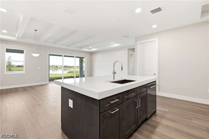 Enjoy a free golf cart with home purchase! This exceptional - photo 5