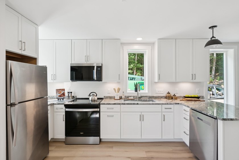 NEW PRICE FOR NEW CONSTRUCTION. Now offered at a reduced price - photo 8