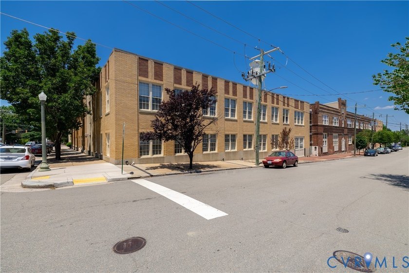 This bright and beautifully updated 2nd floor condo is nestled - photo 2