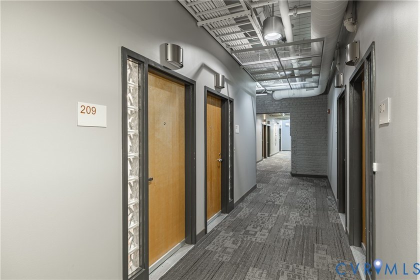 This bright and beautifully updated 2nd floor condo is nestled - photo 4