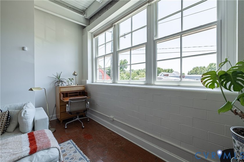 This bright and beautifully updated 2nd floor condo is nestled - photo 7