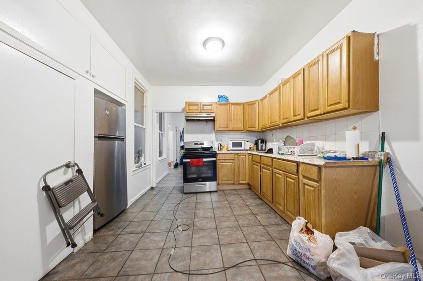 Brick 3-family home in the Grand Concourse featuring three - photo 33