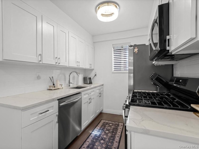 Welcome to this turnkey semi-detached two-unit home with - photo 5