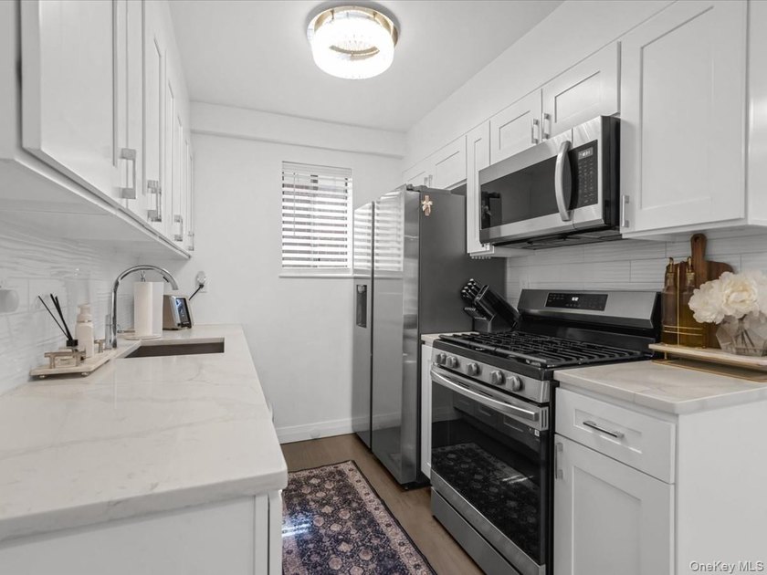 Welcome to this turnkey semi-detached two-unit home with - photo 6