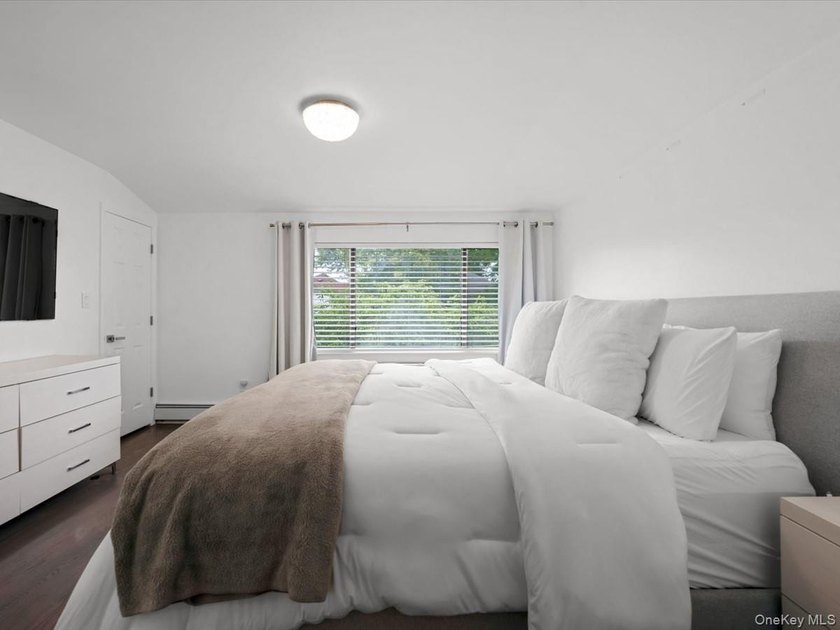 Welcome to this turnkey semi-detached two-unit home with - photo 10