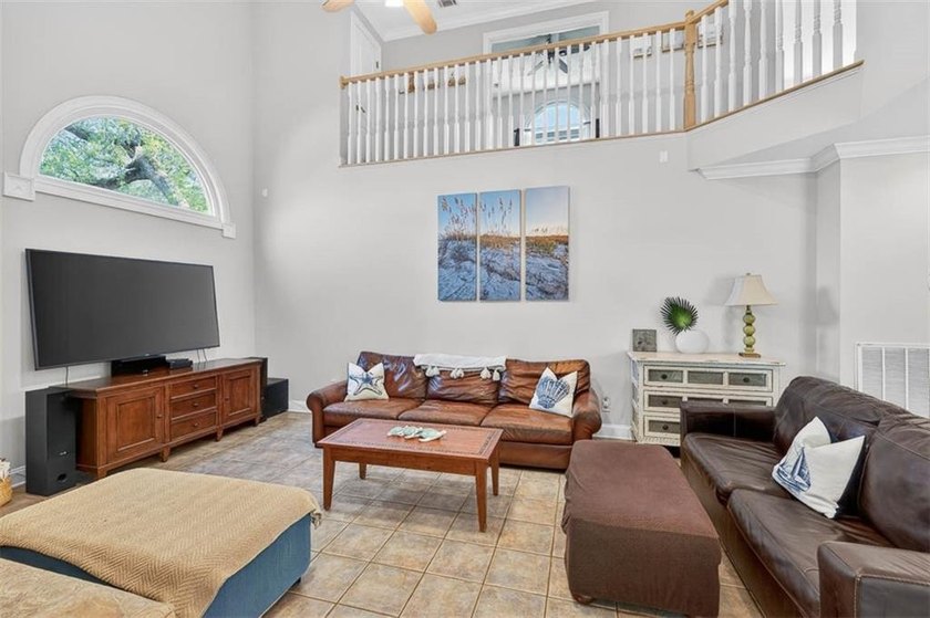 Classic coastal charm meets an unbeatable location in this - photo 12