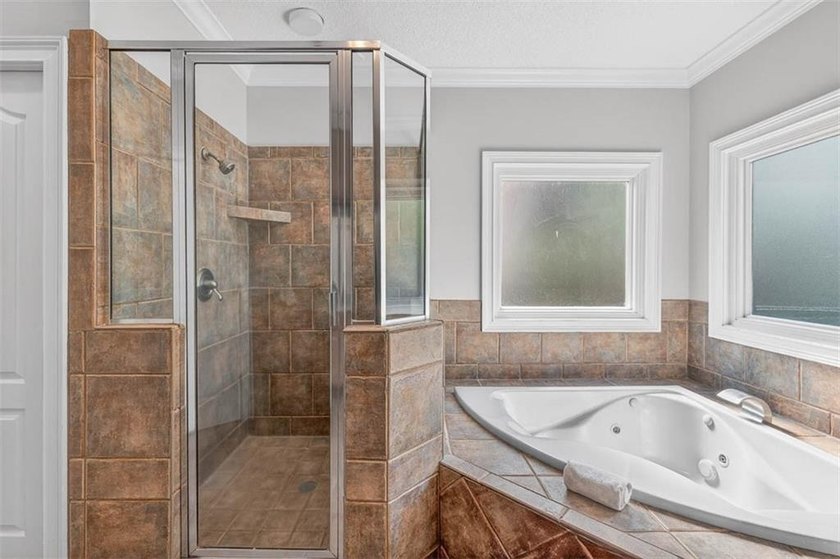 Classic coastal charm meets an unbeatable location in this - photo 19