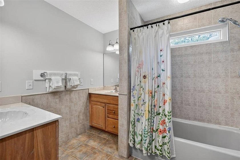 Classic coastal charm meets an unbeatable location in this - photo 23