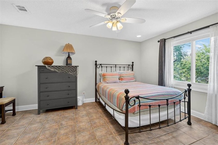 Classic coastal charm meets an unbeatable location in this - photo 27
