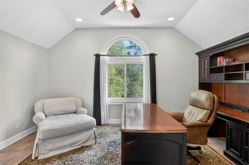 Classic coastal charm meets an unbeatable location in this - photo 32