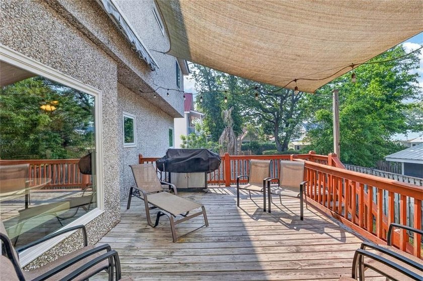 Classic coastal charm meets an unbeatable location in this - photo 34