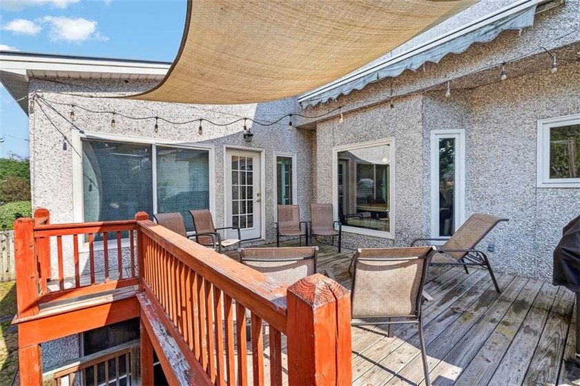 Classic coastal charm meets an unbeatable location in this - photo 35