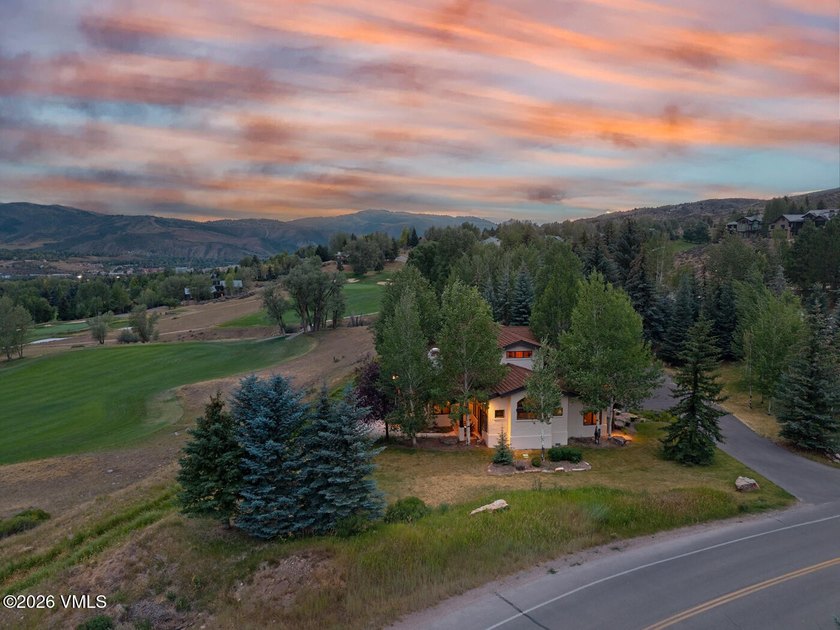 Perched on an exceptional homesite in the coveted Singletree - photo 2