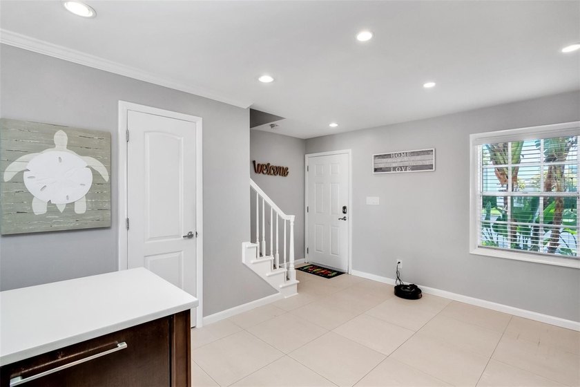 Beautifully updated and offered fully furnished, this - photo 3