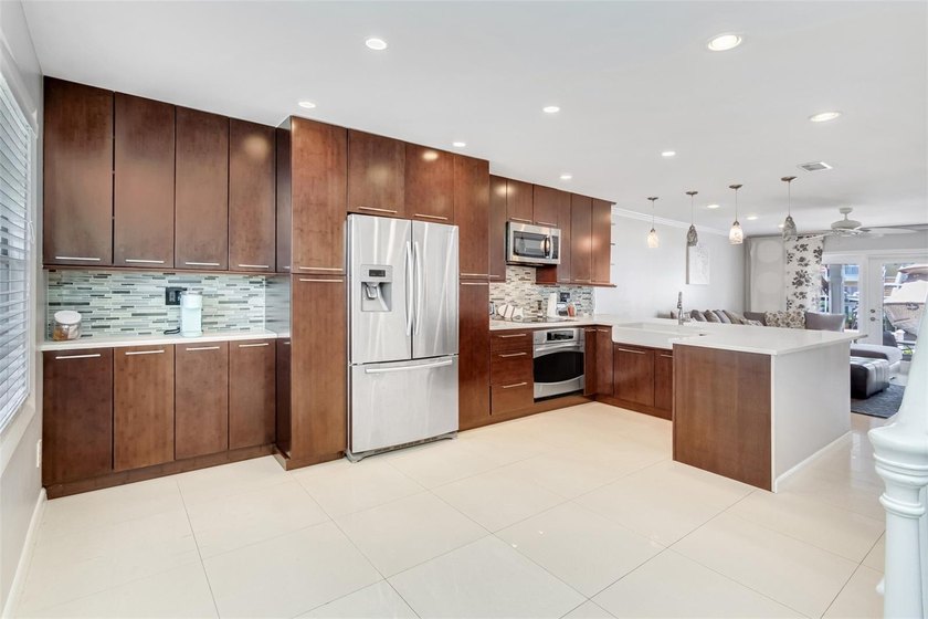 Beautifully updated and offered fully furnished, this - photo 6