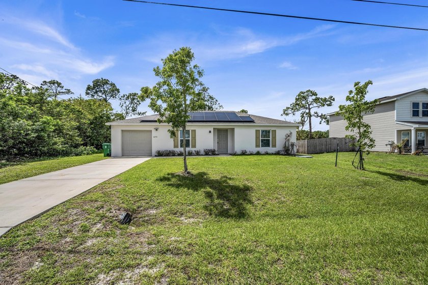 Welcome to this beautifully maintained 2023 built home located - photo 4