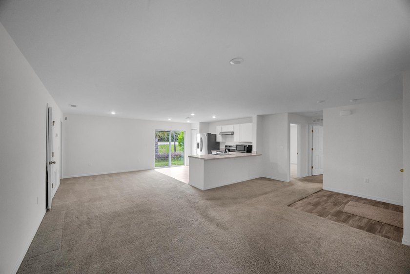 Welcome to this beautifully maintained 2023 built home located - photo 5