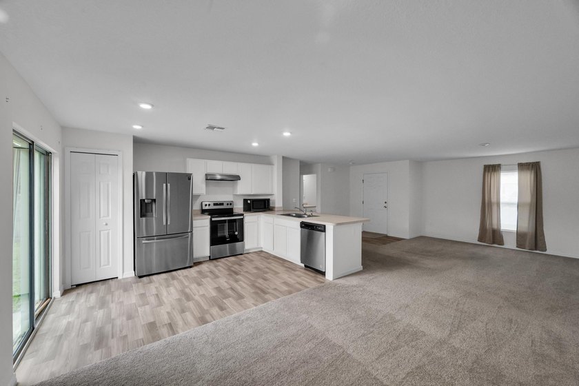 Welcome to this beautifully maintained 2023 built home located - photo 6