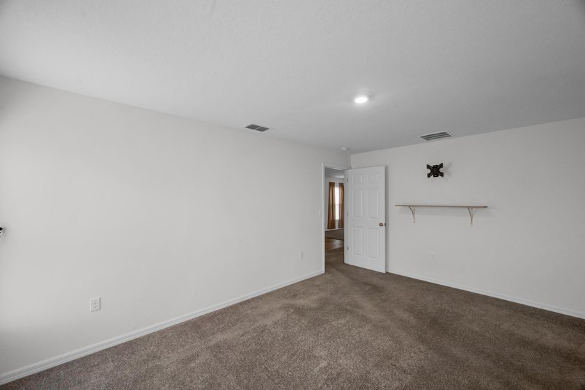 Welcome to this beautifully maintained 2023 built home located - photo 9