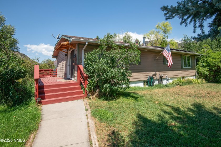 Situated on over one-third of an acre located on a quiet street - photo 2
