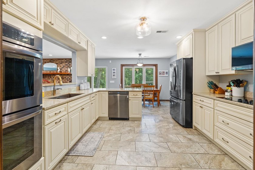 Nestled on over an acre of waterfront property in the desirable - photo 8