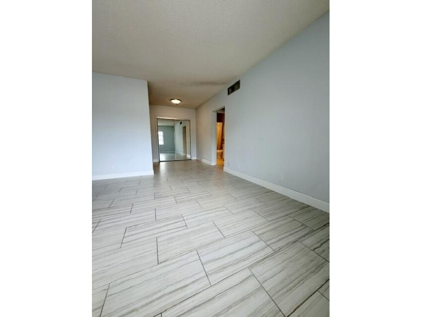 Rare corner unit filled with natural light throughout. This - photo 8