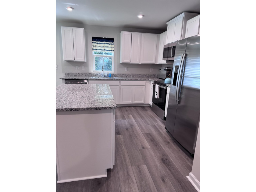 Welcome home to this never-before-lived-in end unit 3-bedroom, 2 - photo 7