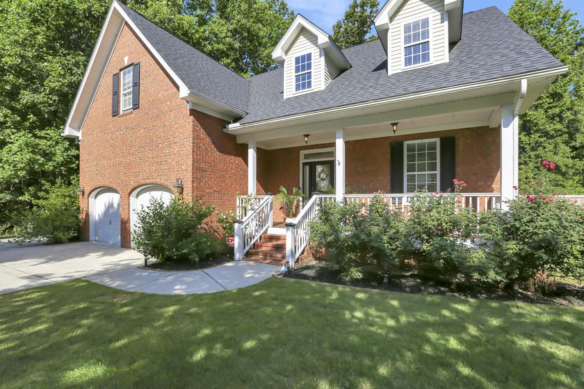 Welcome home to this newly updated, all-brick designer residence - photo 4