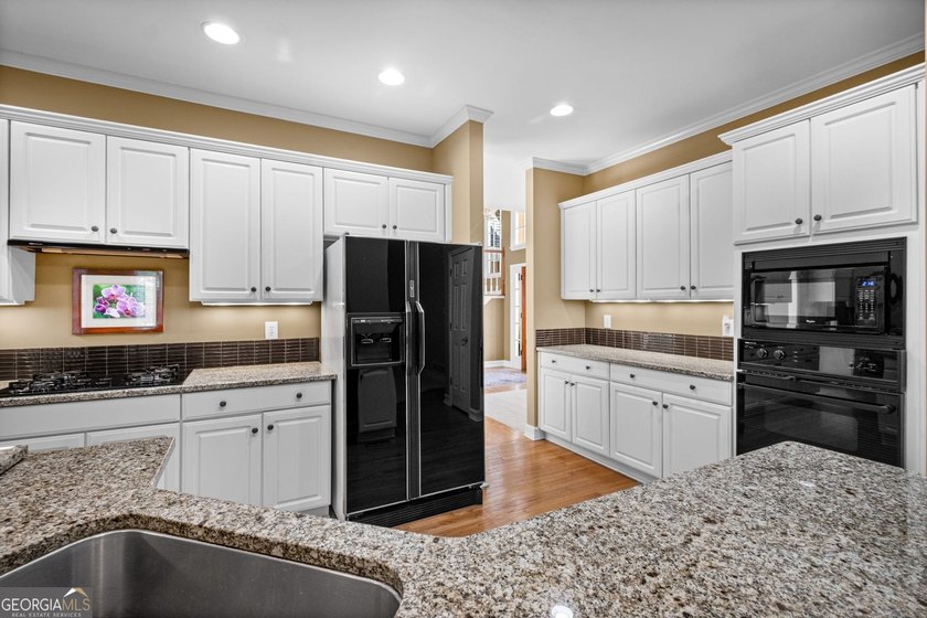 Welcome home to 1605 Amberwood Ct! Nestled on a cul-de-sac in - photo 16