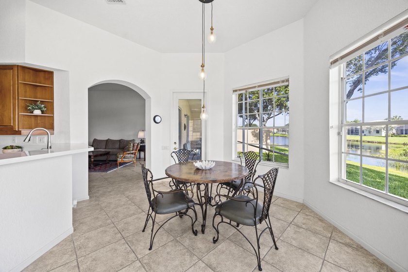 Lake views and sun-filled interiors create a warm, inviting - photo 12