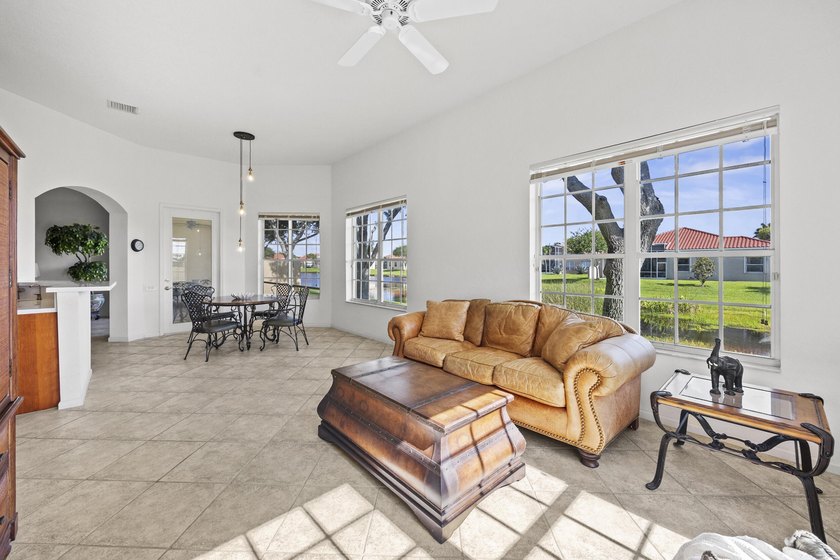 Lake views and sun-filled interiors create a warm, inviting - photo 13