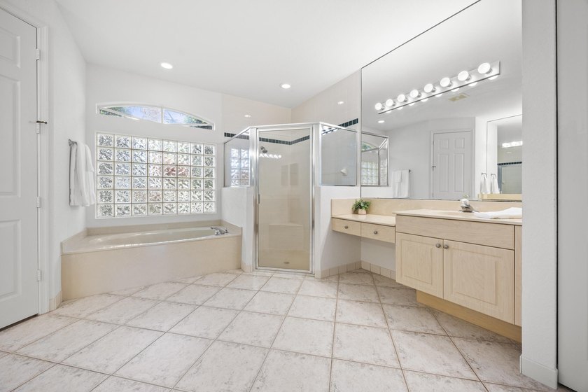 Lake views and sun-filled interiors create a warm, inviting - photo 16