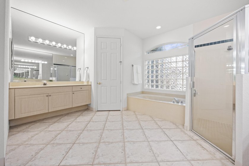 Lake views and sun-filled interiors create a warm, inviting - photo 17