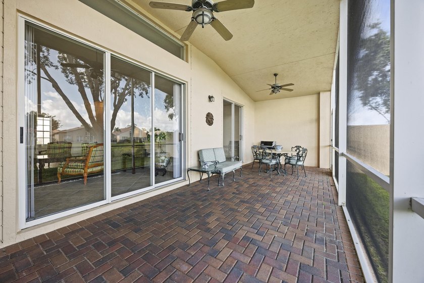 Lake views and sun-filled interiors create a warm, inviting - photo 24