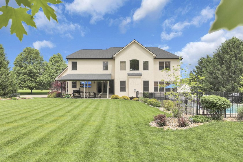 1.35-acre estate,framed by a dense, private wall of mature trees - photo 9