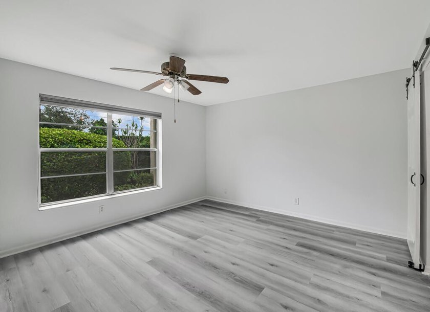 Welcome to this newly renovated, move-in-ready first-floor condo - photo 21