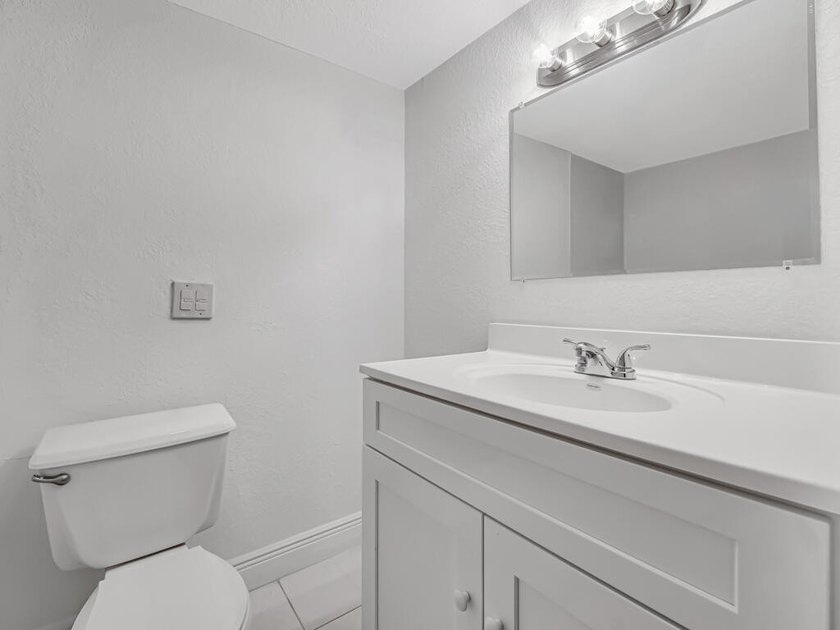 Welcome to this newly renovated, move-in-ready first-floor condo - photo 24