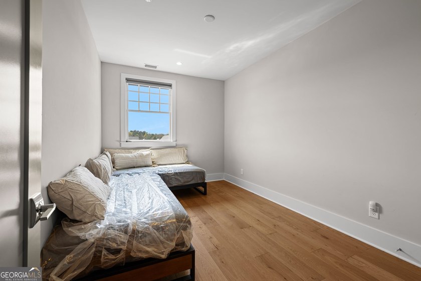 Indulge in luxury at this exquisite Triangle Park townhome. It's - photo 33