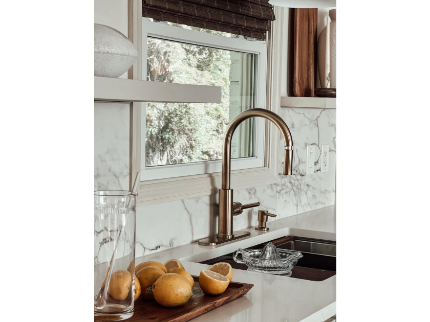 Welcome to this exquisitely renovated designer brick ranch - photo 10