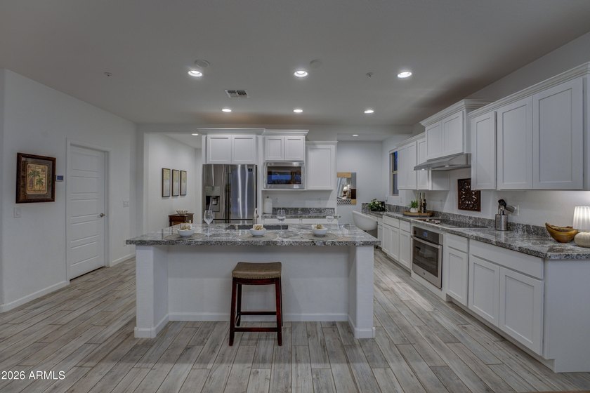 Experience luxury living in the prestigious Trilogy at Verde - photo 11