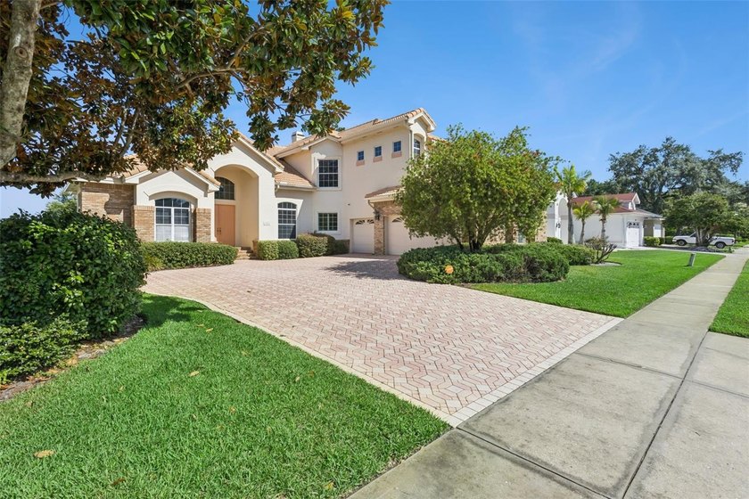 Experience exceptional lakefront living in this custom-built - photo 4