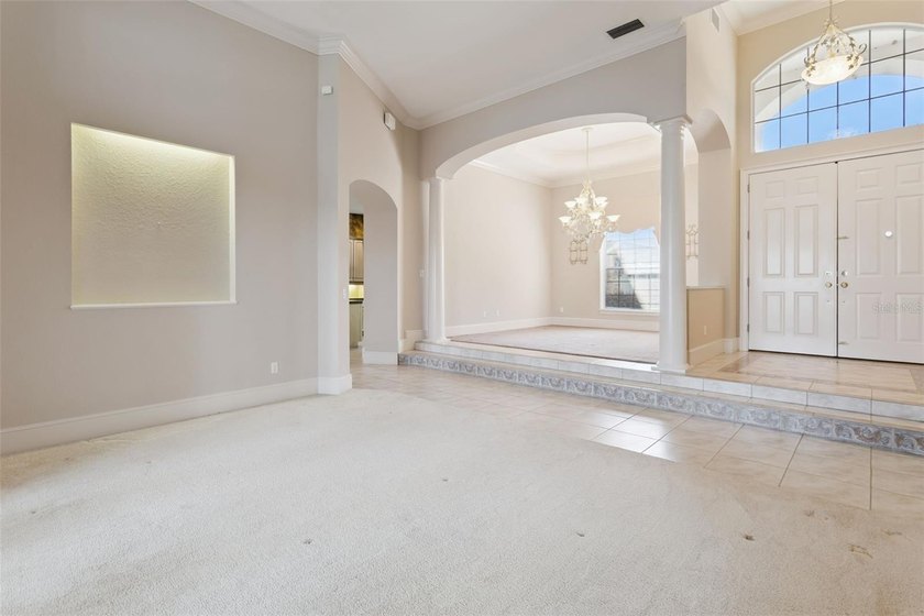 Experience exceptional lakefront living in this custom-built - photo 6