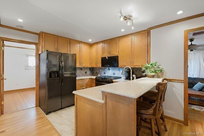 Welcome to this charming 4-bedroom, 2-bath home nestled in the - photo 5