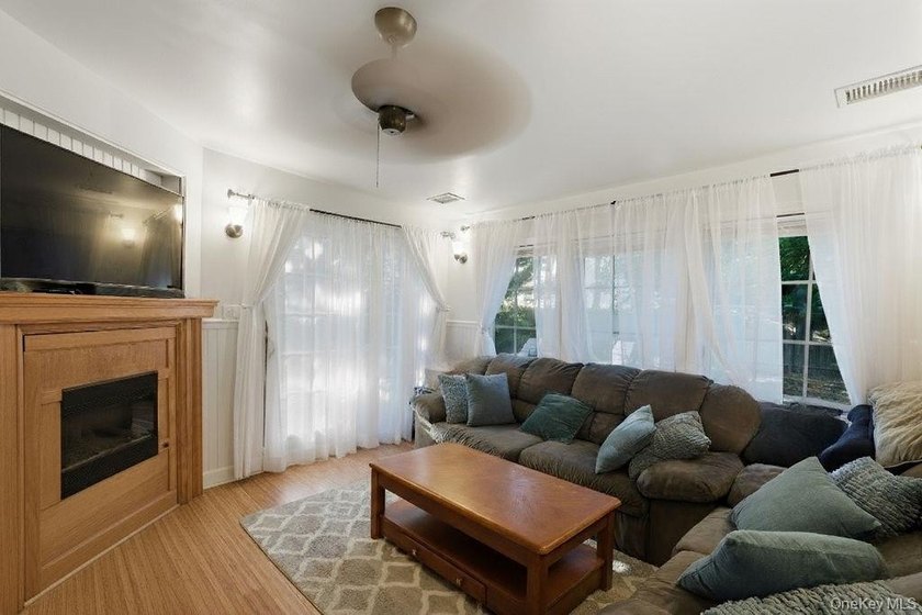 Welcome to this charming 4-bedroom, 2-bath home nestled in the - photo 7