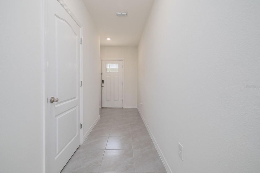 Welcome home to Bella Oaks! Incredible townhouse located in the - photo 3