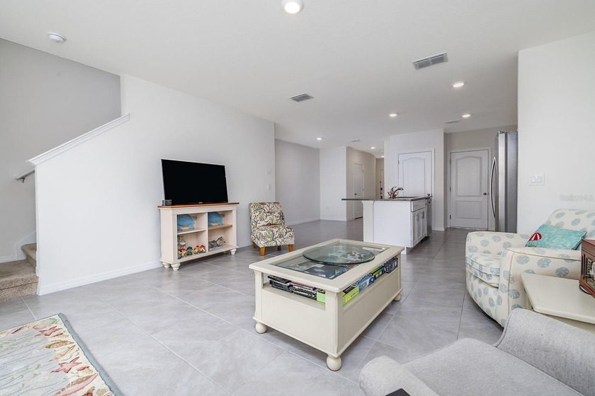 Welcome home to Bella Oaks! Incredible townhouse located in the - photo 7